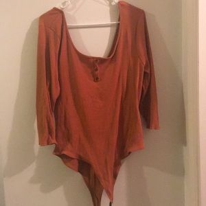 Orange off the shoulder body suit